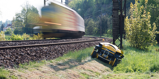 Spider ILD02 mower cutting grass along railway verge