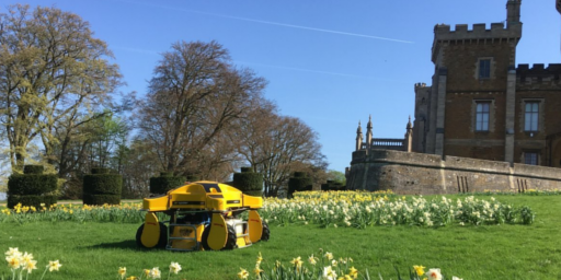 Spider ILD01 cutting grass in castle grounds garden